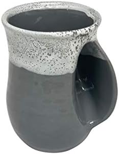 Чаша за нагряване на ръка от глина в движенията на дясната ръка, сняг капачка)